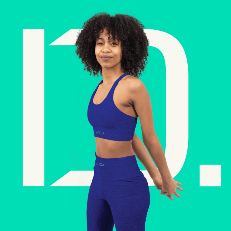 Branding Package pricing-a woman in blue activewear on a green background